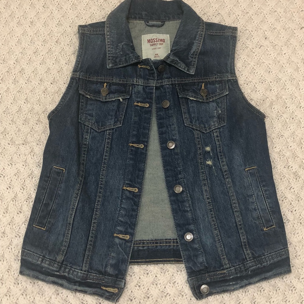 Sleeveless Jean jacket with a bit of distress